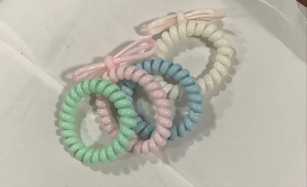 Ponytail cord coils